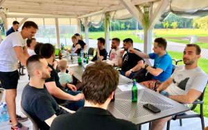 integration meeting of the Concise team under the wooden gazebo